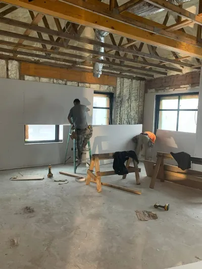 Construction team working on kitchen renovation